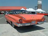 Rear view of a 1960 Buick Invicta 2-door hardtop, showing its signature delta fins