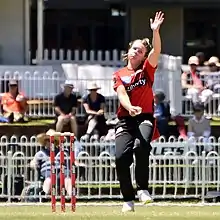 Leeson bowling for Melbourne Renegades during WBBL07
