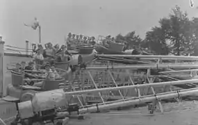 Kids on amusement park ride at Belmont Park, 1941