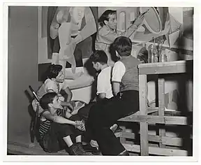 Artist Philip Guston working on a mural in 1940.
