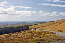brown moorland and forestry with distant views