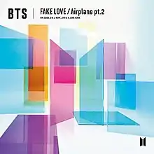 Several translucent colorful shapes overlap one another on a white background. The words "BTS Fake Love / Airplane Pt. 2 appear in the top left."