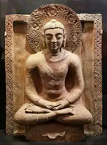 Buddha from the Kahu-Jo-Darro stupa at Mirpur Khas, Sindh, circa 410 CE. This is a conflation of the Greco-Buddhist art of Gandhara, and Gupta art.