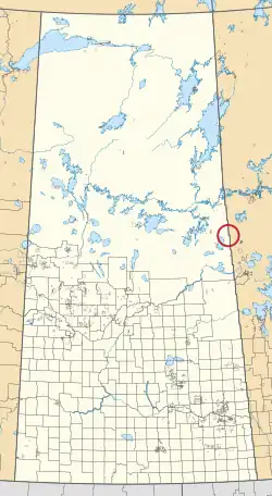A map of the province of Saskatchewan showing 297 rural municipalities and hundreds of small Indian reserves. One is highlighted with a red circle.