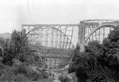 1913 view looking north at the Colorado Street Bridge under construction and the Scoville Bridge behind