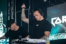 Corey James (right) performing at Beats for Love (2019)