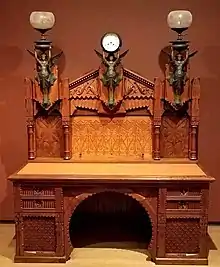 Desk; designed by Frank Furness, made by Daniel Pabst; 1870–1871; walnut, walnut veneer, rosewood (knobs), brass, iron, steel and glass; 196.9 × 157.5 × 81.9 cm; Philadelphia Museum of Art (Philadelphia, USA)