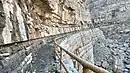 Very steep and rocky path, partly stepped with stone. Some sections are protected with safety railings. Wadi Litibah.