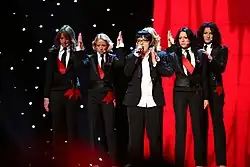 Beauty Queens sing "Molitva" with Marija Šerifović at Eurovision Song Contest 2007. From left to right: Suzana Dinić, Ana Milenković, Ivana Selakov, Sanja Bogosavljević, Ksenija Milošević