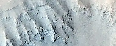 Close view of layers in Louros Valles, as seen by HiRISE under HiWish program  Note this is an enlargement of a previous image.