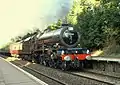 LMS Stanier 4-6-2 "Princess Elizabeth" 6201 powers through the station on a heritage railtour.
