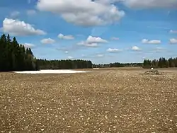 Fallow field with cult stone in Kanavere