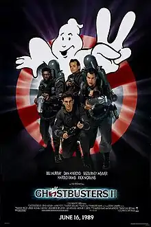 Bill Murray, Dan Aykroyd, Harold Ramis, and Ernie Hudson face the viewer. They are armed with slime throwing weapons resembling guns, with large tanks on their back. Behind them is a large logo of a "no ghosts" sign holding up two fingers. The logo "Ghostbusters II" is printed beneath them.