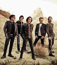 Journey in 2013 from left to right:
Neal Schon, Deen Castronovo, Arnel Pineda, Ross Valory, Jonathan Cain