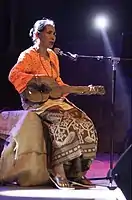 Sumba, Indonesia. Kahi Ata Ratu performing on the Junga. Originally a boat lute, this type was modeled after a Portuguese instrument.