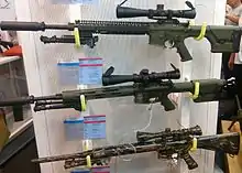 Gen 3, 4 & 5 Marine Scout Sniper Rifles on display.