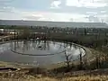 Nautilus Pond from the escarpment with Calgary Olympic Park in the background