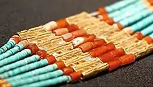 Necklace decorated with granulation, unearthed in Majiayuan, Gansu Provincial Institute of Cultural Relics and Archaeology.