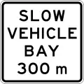 (A42-4/IG-9) Slow Vehicle Bay Ahead (in 300 metres)