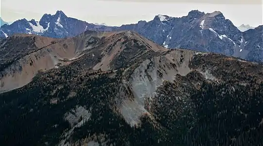 North Tatie Peak (7,370&nbsp;ft) centered. Viewed from Slate Peak. (Azurite Peak left, Mt. Ballard right)