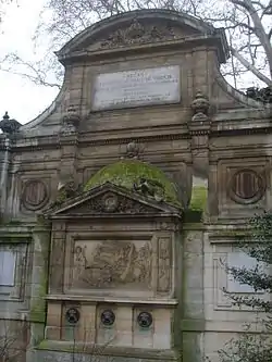 The Fontaine de Léda, (1806–1809), originally at rue Vaugirard and rue du Regard, since 1858 hidden behind the Medici Fountain in the Jardin du Luxembourg. Louis-Simon Bralle, architect, Achille Valois, sculptor.