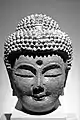 Head of Buddha, 10th–11th century.  Cast iron, h. 37.4&nbsp;cm.  National Museum of Korea.