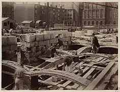 Rafael Guastavino inspecting recently laid tile arch along Boylston Street