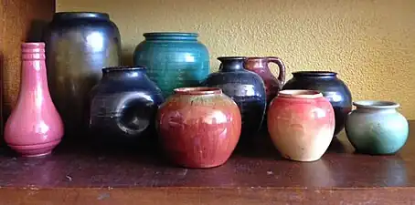 Various undecorated Newcomb College Pottery pieces showing a variety of forms
