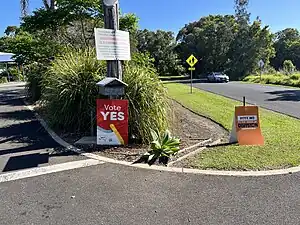 Lawn signs outside a polling station for the October 2023 constitutional referendum on establishing a Voice to Parliament for Australia's Aboriginal and Torres Strait Islander population. Lucas remarked on how the fourth episode - which centres on the debate about recognition of Australia's original inhabitants during the country's celebration of the 200th anniversary of the first British settlers landing, and the media treatment of protests and views that run against such a buoyant mood - happened to have aired during the campaign period.