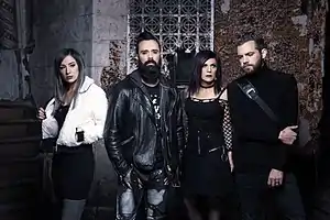 Press photo of Skillet, 2019. From left to right: Jen Ledger, John Cooper, Korey Cooper and Seth Morrison.