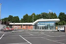 The new glass-fronted station building, opened 2020.