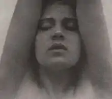 Tina Modotti with arms raised - Edward Weston, c. 1921