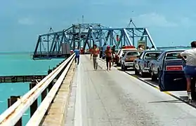 Traffic waiting for the open swing span over Moser Channel.