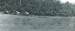 Three Decauville steam locomotives and three Campagne rail tractors on a forest railway at the Société Legros in Aguémoné near Ayem, ca 1935