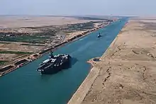 USS America (CV-66), an American aircraft carrier in the Suez Canal