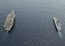 JS Hyūga and USS George Washington on 17 November 2009.