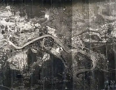 The 3rd Aerospace Rescue Recovery Group used this mosaic reconnaissance photograph to plan Lt. Col. Hambleton and 1st Lt. Mark Clark's rescue. The Cam Lo Bridge is shown at the far left. On 7 April, Hambleton was about 1,000 yards (910&nbsp;m) above the river and Clark was near the river.: 76 