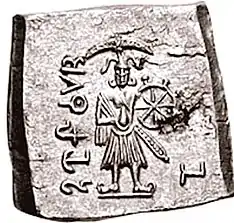 A chatra crowning Vāsudeva-Krishna on a coin of Agathocles of Bactria, c. 180 BCE.