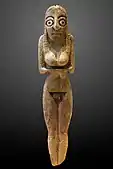 Mortuary figurine of a woman; 4400–4000 BC; crocodile bone; height: 8.7 cm; Louvre