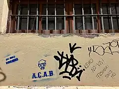 A pig above ACAB, beside anti-Fujimorist graffiti in Cusco