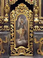 Michael's icon on the northern deacons' door on the iconostasis of Hajdúdorog. The archangel is often depicted on iconostases' doors as a defender of the sanctuary.