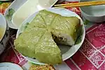 Bánh chưng a savoury rice cake with mung beans and pork fillings, usually consumed during Tết