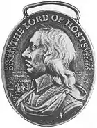 A photograph of a military medal, which bears a relief of Oliver Cromwell's profile