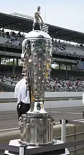 The silver Borg-Warner Trophy on display at the Indianapolis Motor Speedway
