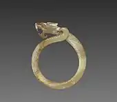 Fluted ring with a dragon head (huan); circa 475 BC; jade (nephrite); overall: 9.1&nbsp;cm; Cleveland Museum of Art (Cleveland)