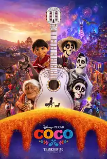 Theatrical release poster depicting the characters Coco, Dante the dog, Miguel, Héctor, Ernesto, and Imelda when viewing clockwise from the bottom left around the white Day of the Dead-styled guitar. The guitar has a calavera-styled headstock with a small black silhouette of Miguel, who is carrying a guitar, and Dante (a dog) at the bottom. The neck of the guitar splits the background with their village during the day on the left and at night with fireworks on the right. The film's logo is visible below the poster with the "Thanksgiving" release date.