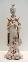 Tomb figure of a lady attendant, 7th- to 8th-century; during the Tang era, female hosts prepared feasts, tea parties, and played drinking games with their guests.