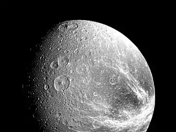 Fractured terrain on Dione imaged from a distance of 240,000&nbsp;km from Voyager 1