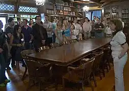 Group tours the FEE library at the Hillside estate