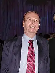 An older man wearing a suit